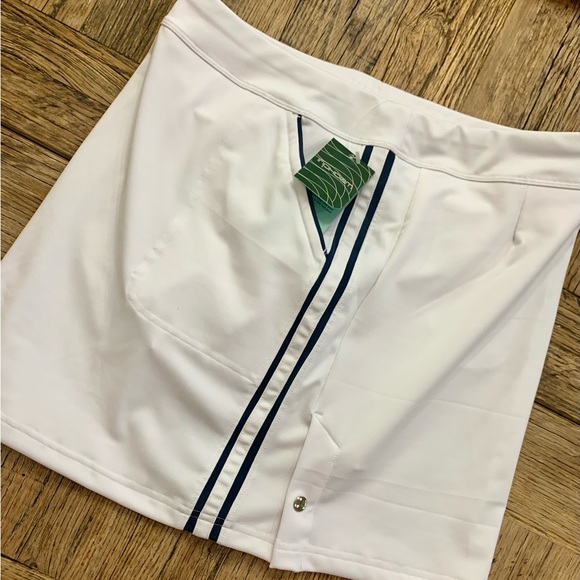 Brand new white Inphorm tennis skirt with pockets. Navy stripes down each side. - Picture 3 of 4